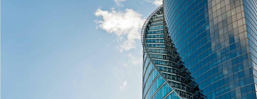 blue building and sky with clouds