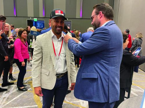 Daynon Kirby, CCIM, being pinned by fellow The CCIM Institute Middle Tennessee Chapter in Seattle Washington.