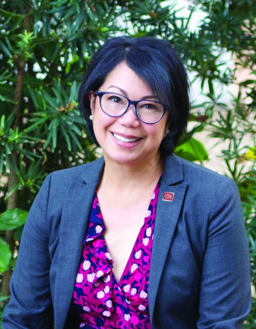 The CCIM Institute Member, Veronica Malolos, CCIM posed for headshot with her CCIM pin