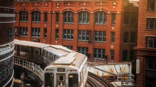 life in the city with an elevated train