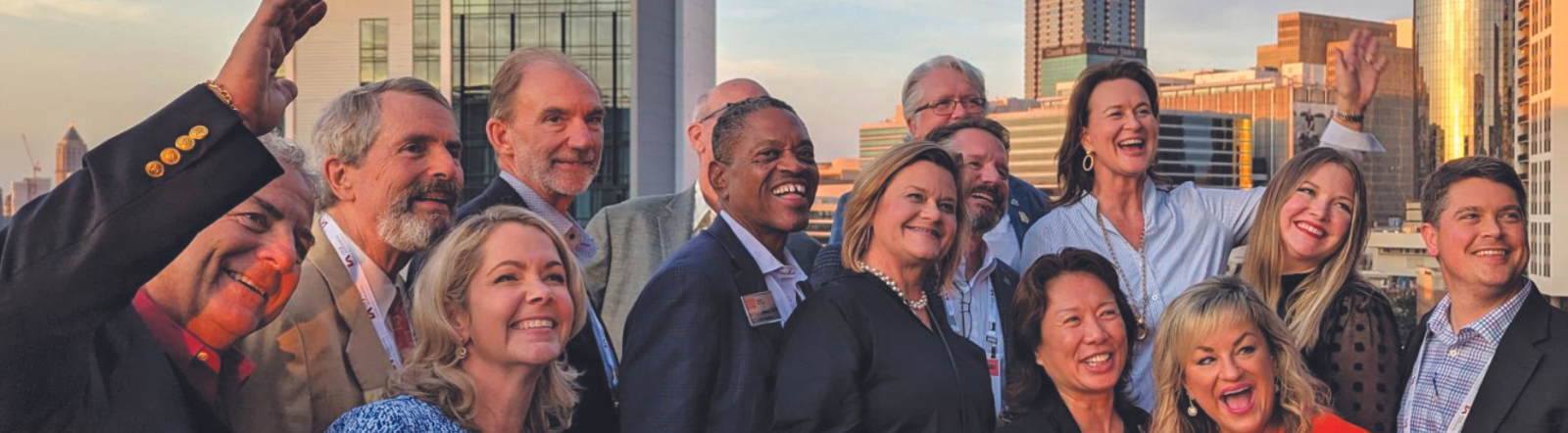 A group of CCIMs posing in front of the Seattle Skyline in October 2023.