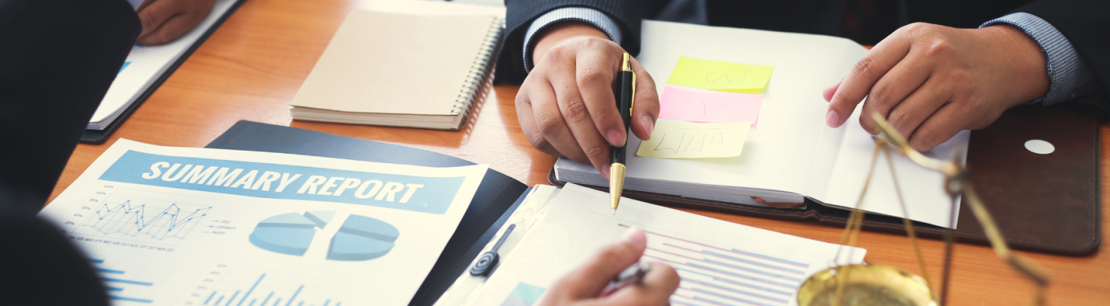 Business People looking at various paperwork