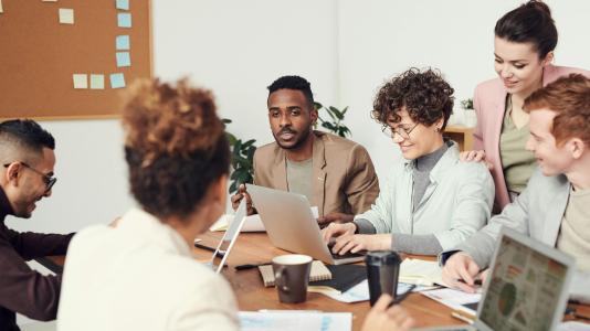 adult students around a desk