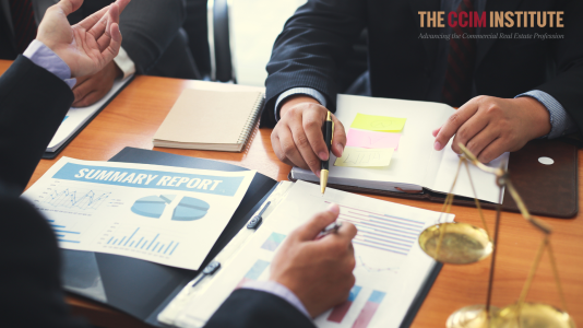 Business People looking at various paperwork